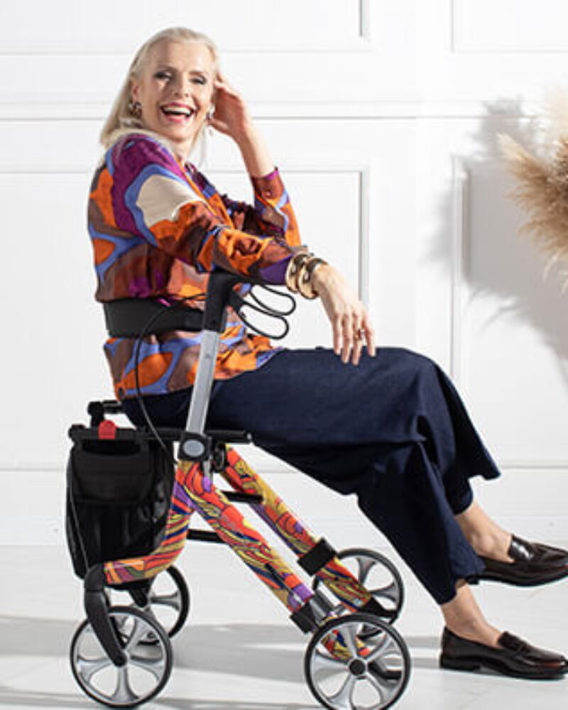 LADY SITTING ON ART LINE SPACE LX ROLLATOR
