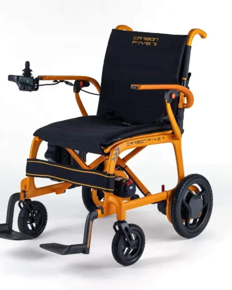 side view of a carbon flyer powerchair in orange