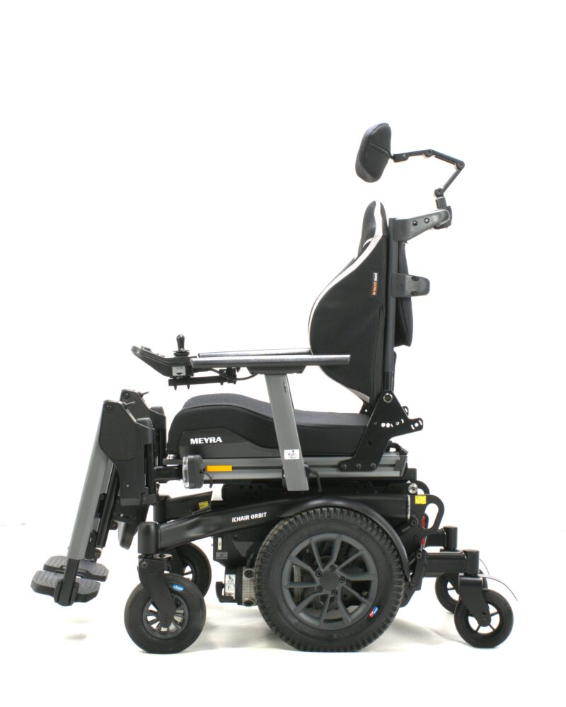 side view of a all black orbit 2 powerchair against a white background